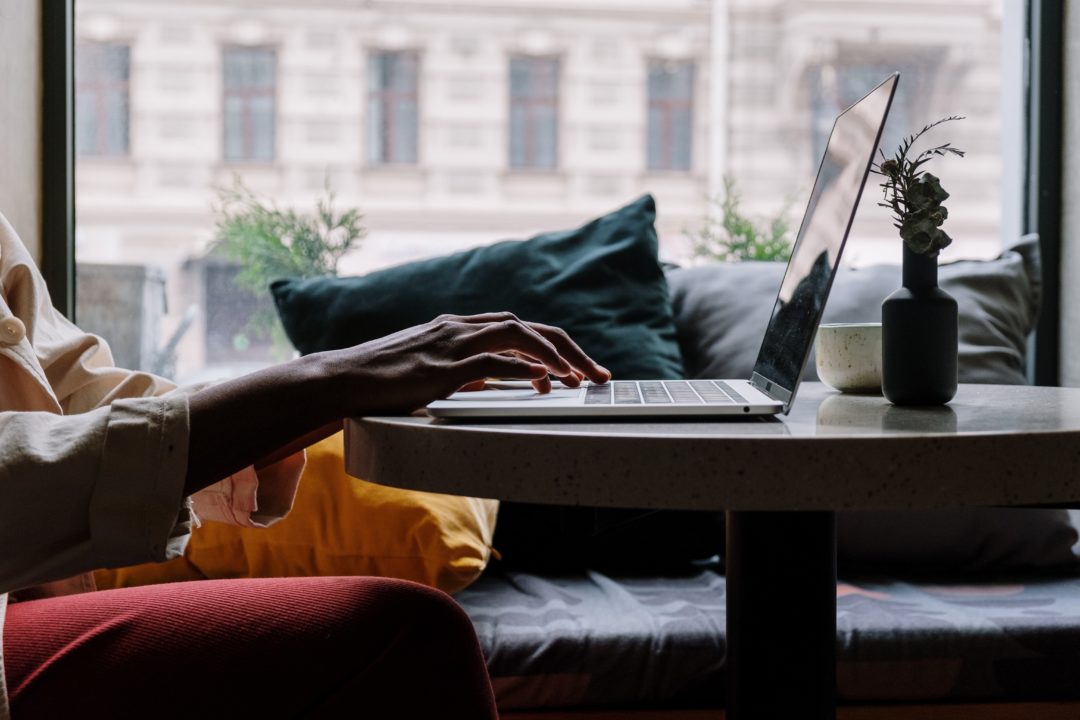 person on computer