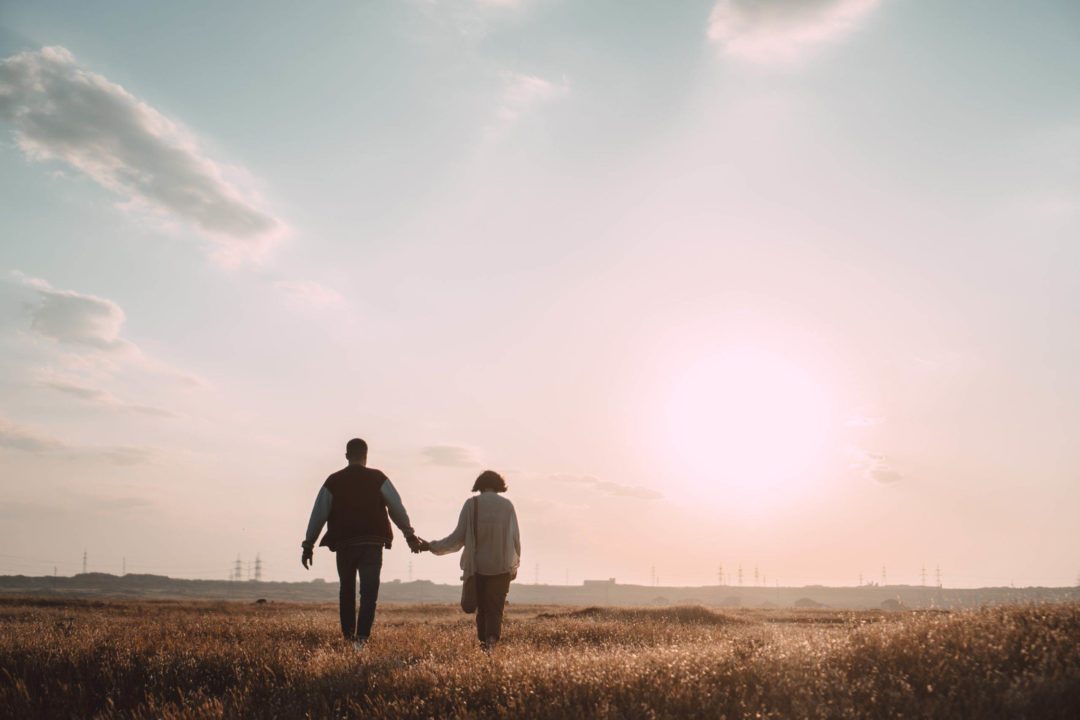 couple holding hands