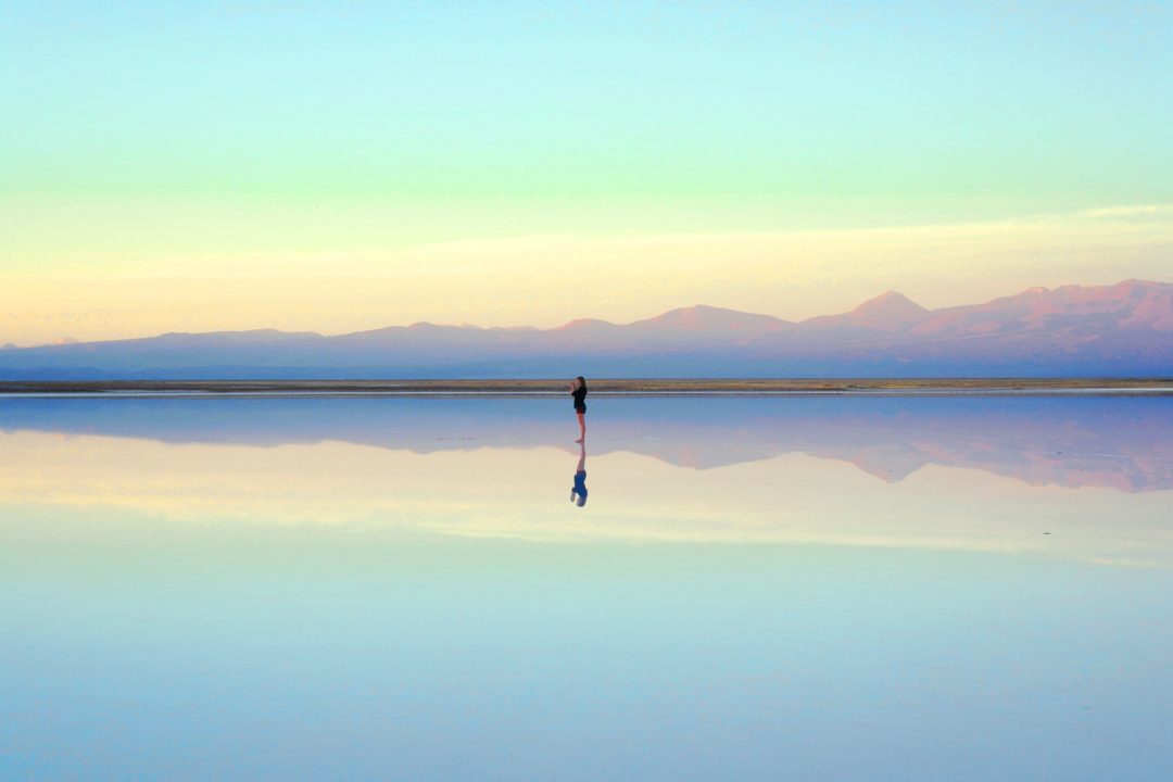 person in mountains at morning