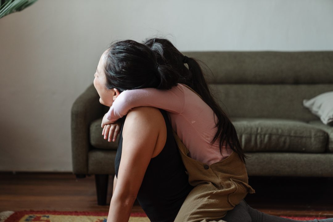 Mom and daughter hugging