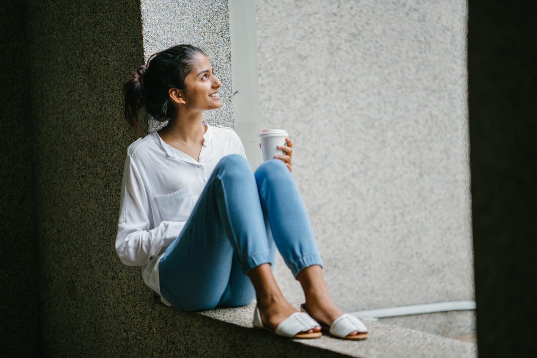 woman sipping coffee