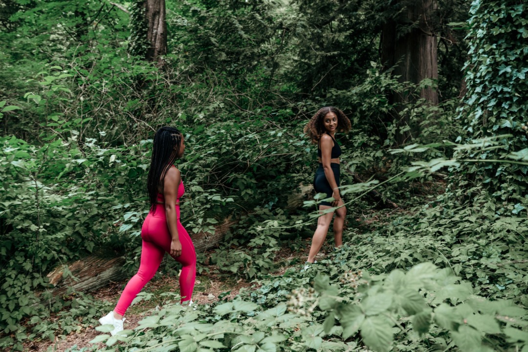 Two women hiking in the woods
