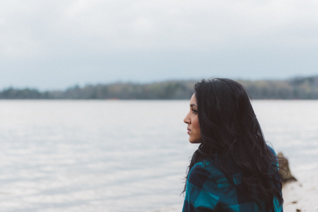 woman looking out at water