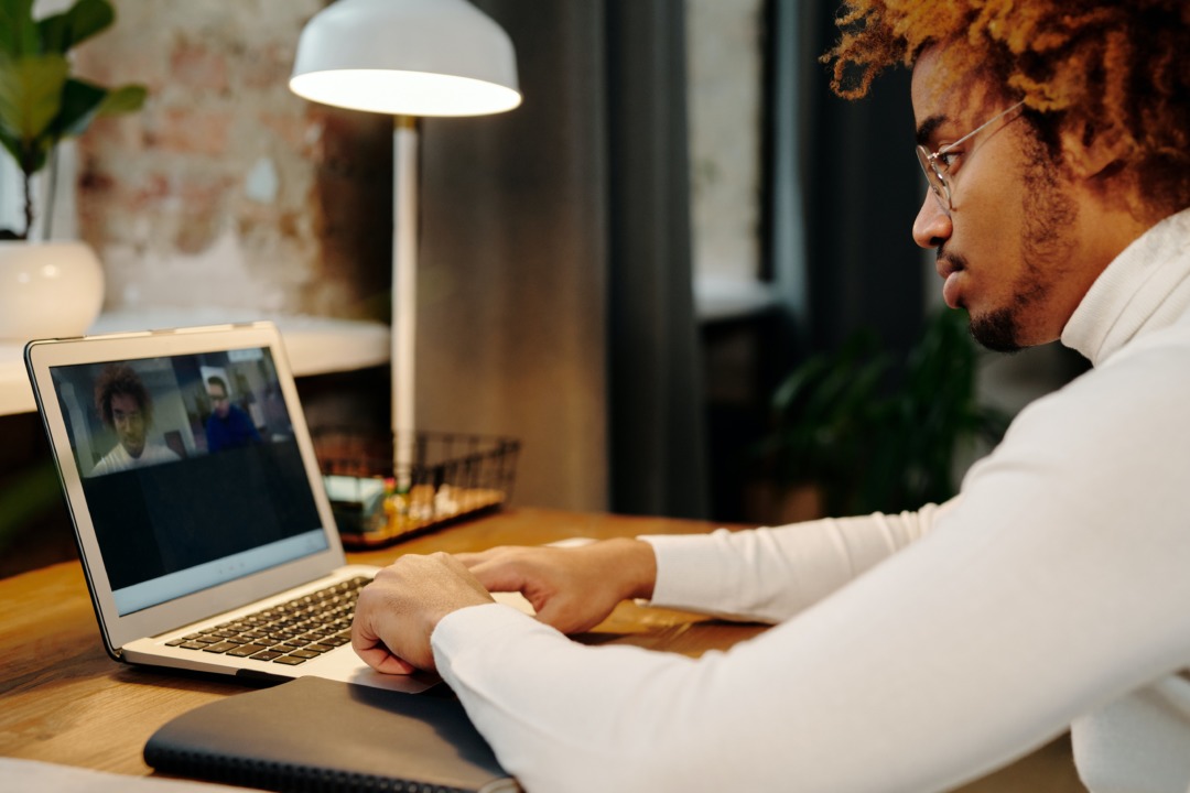 Person on video call on computer